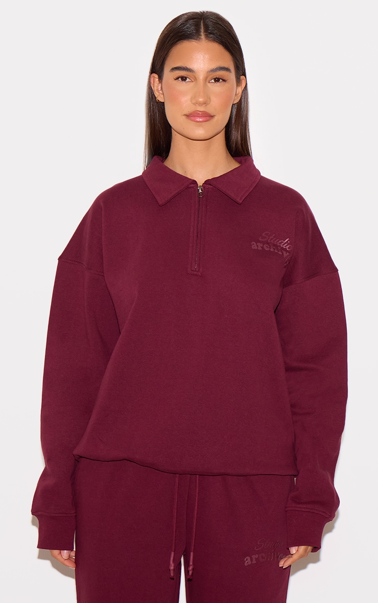 PRETTYLITTLETHING Burgundy Premium Studio Archives Collared Sweatshirt
